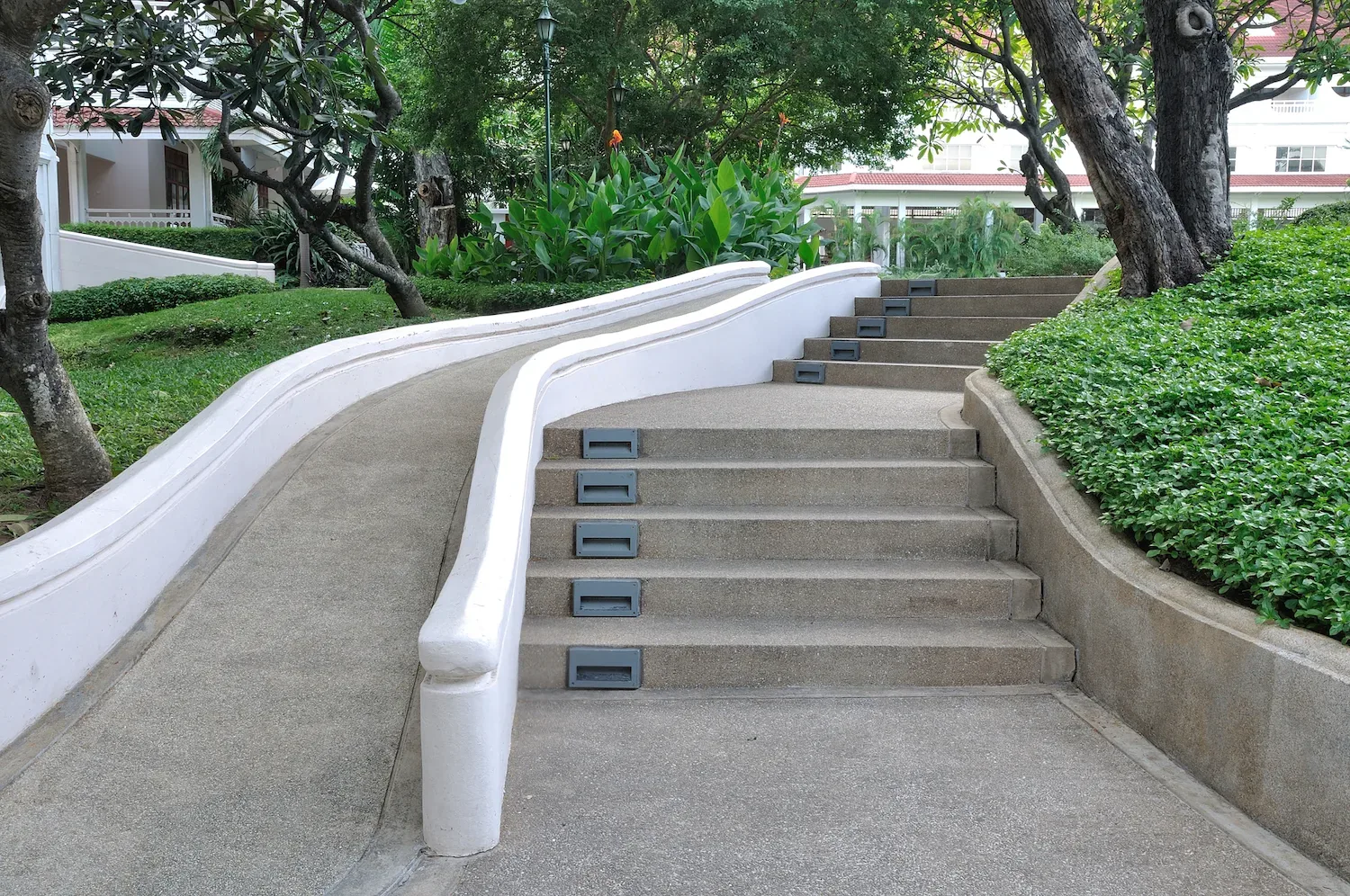Concrete access ramp built to grade