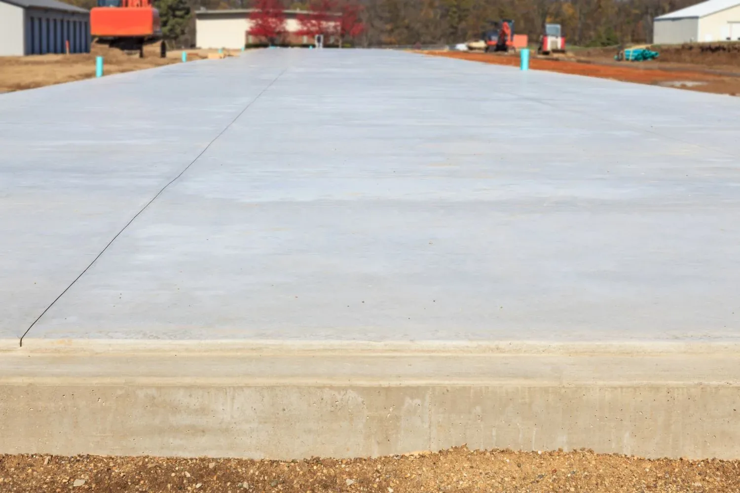 Level concrete slab poured ahead of a new build