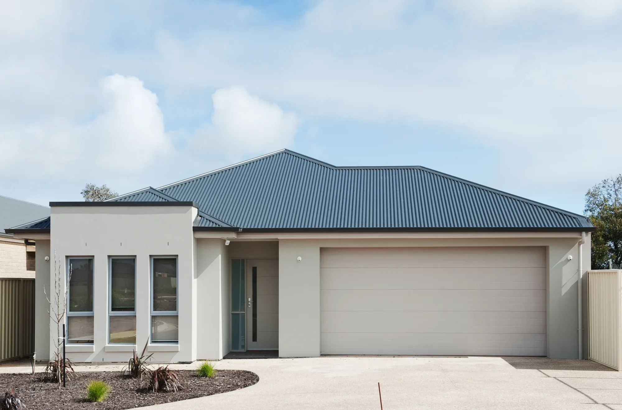 Plain concrete driveway with sawn joints